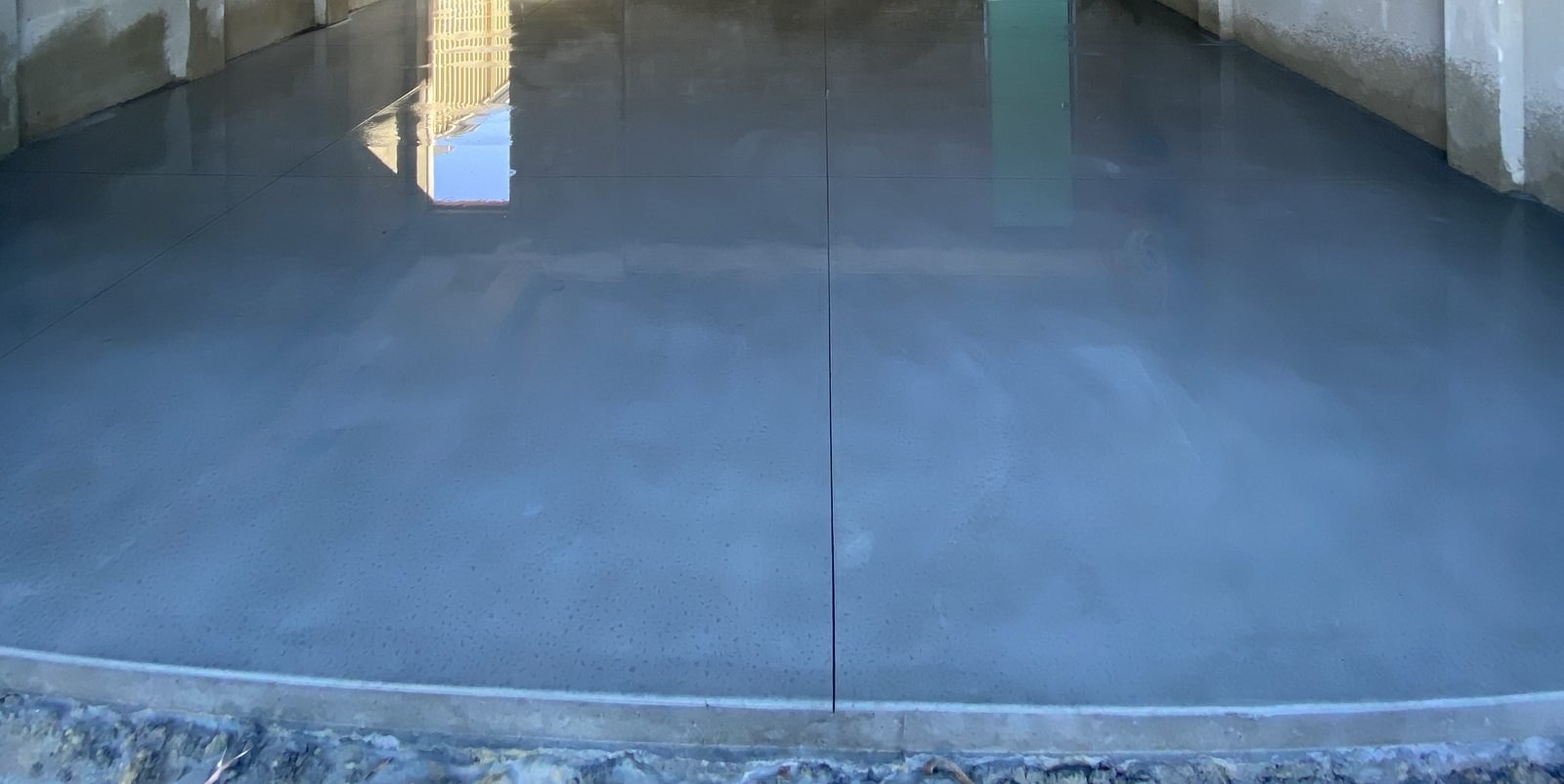 Freshly poured shed slab with thickened edges ready for the frame, Medowie